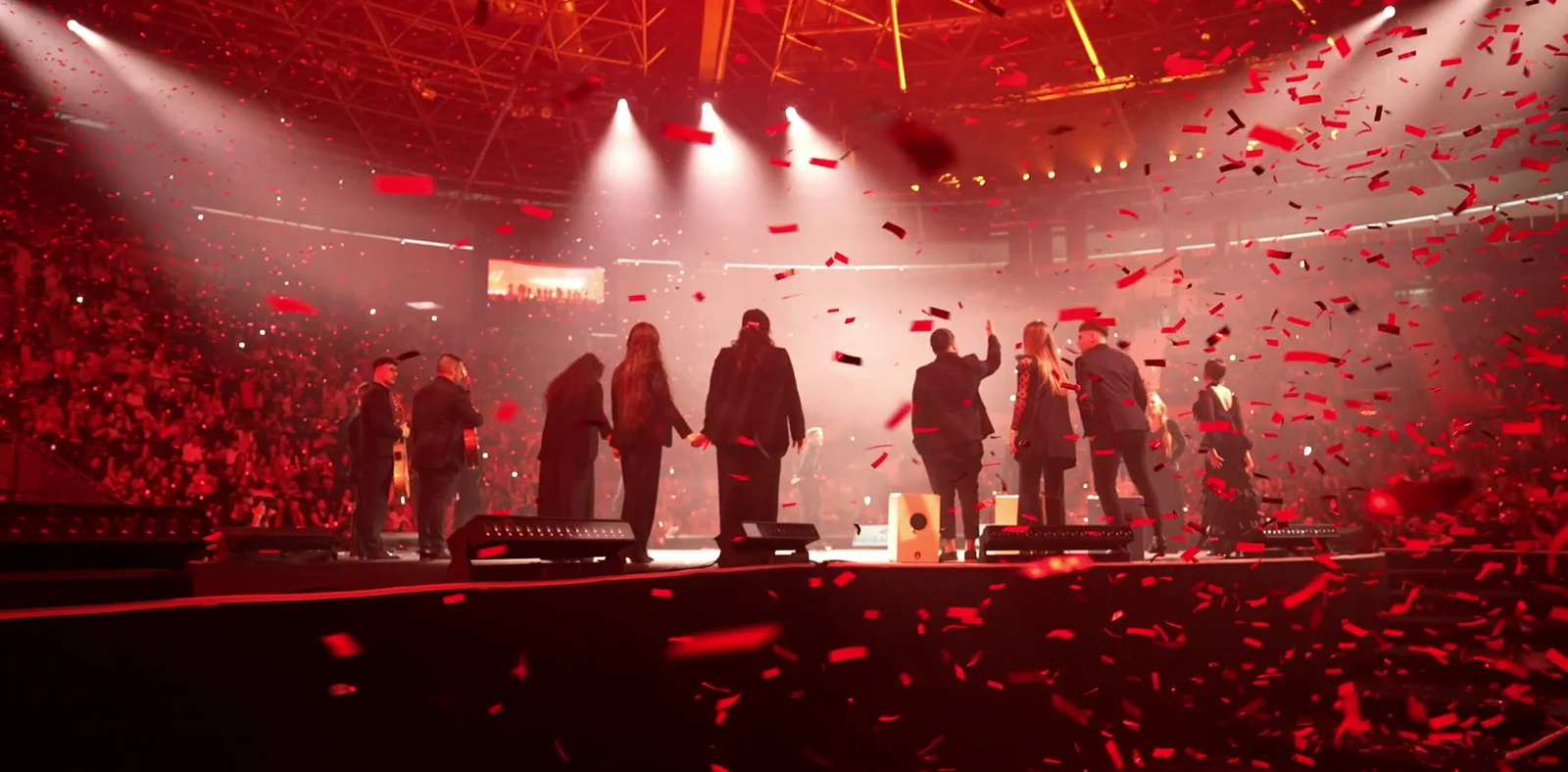 BTIG event production with live performance and red confetti